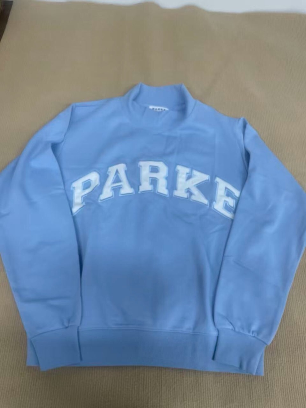 Parker Men's Light Blue Crewneck Sweater with White Applique